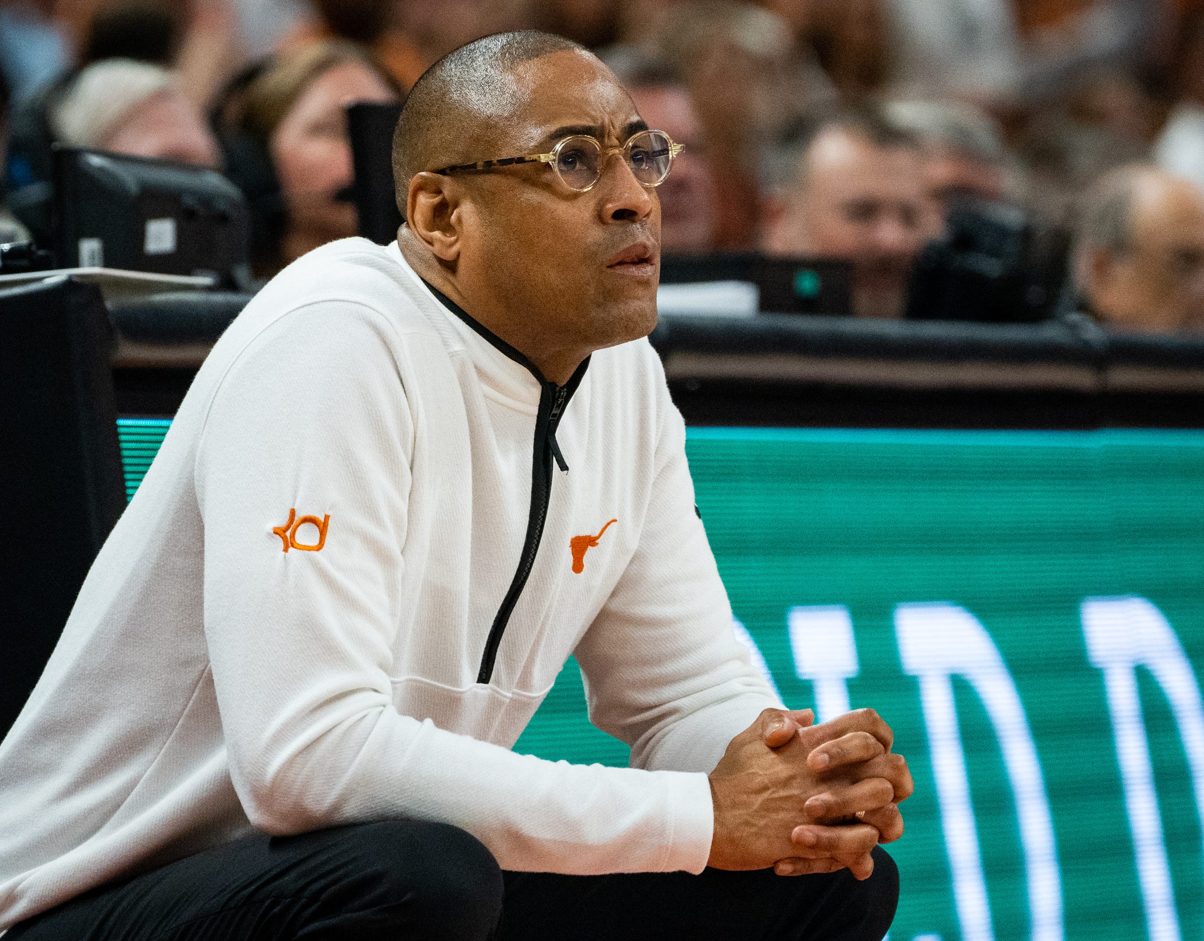 what happened to texas head basketball coach