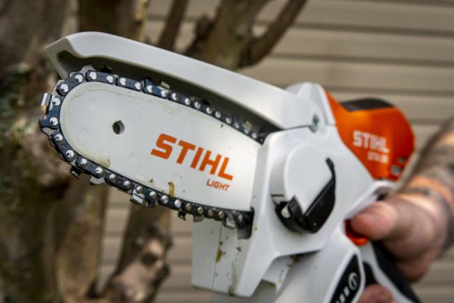 hand held chain saw