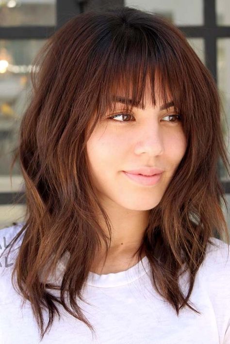 medium layered hair with fringe