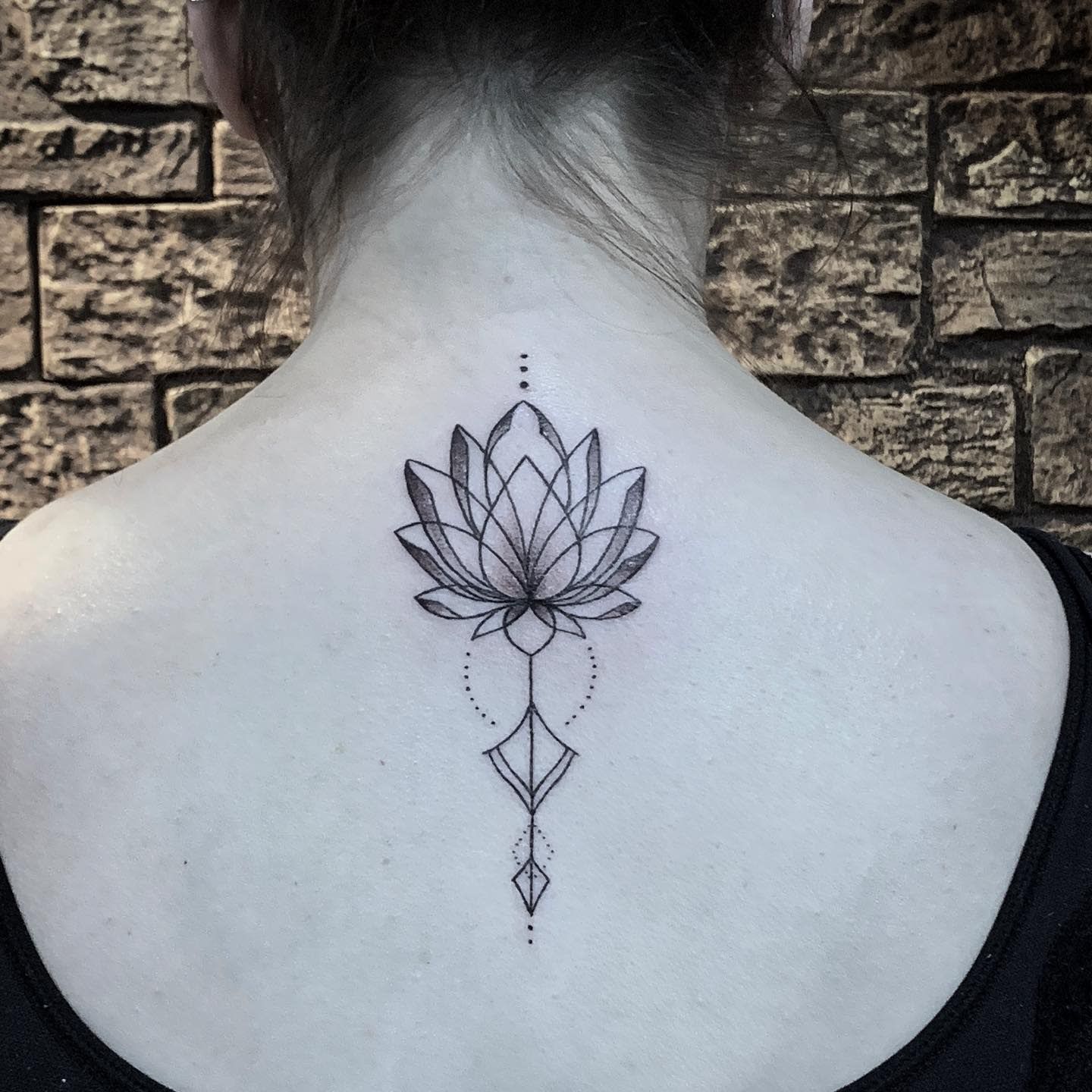 simple water lily tattoo