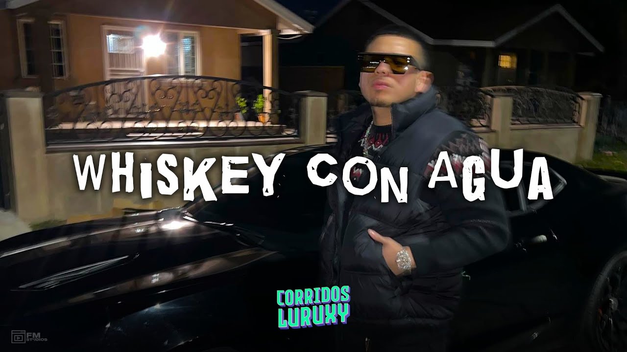 whiskey con agua lyrics