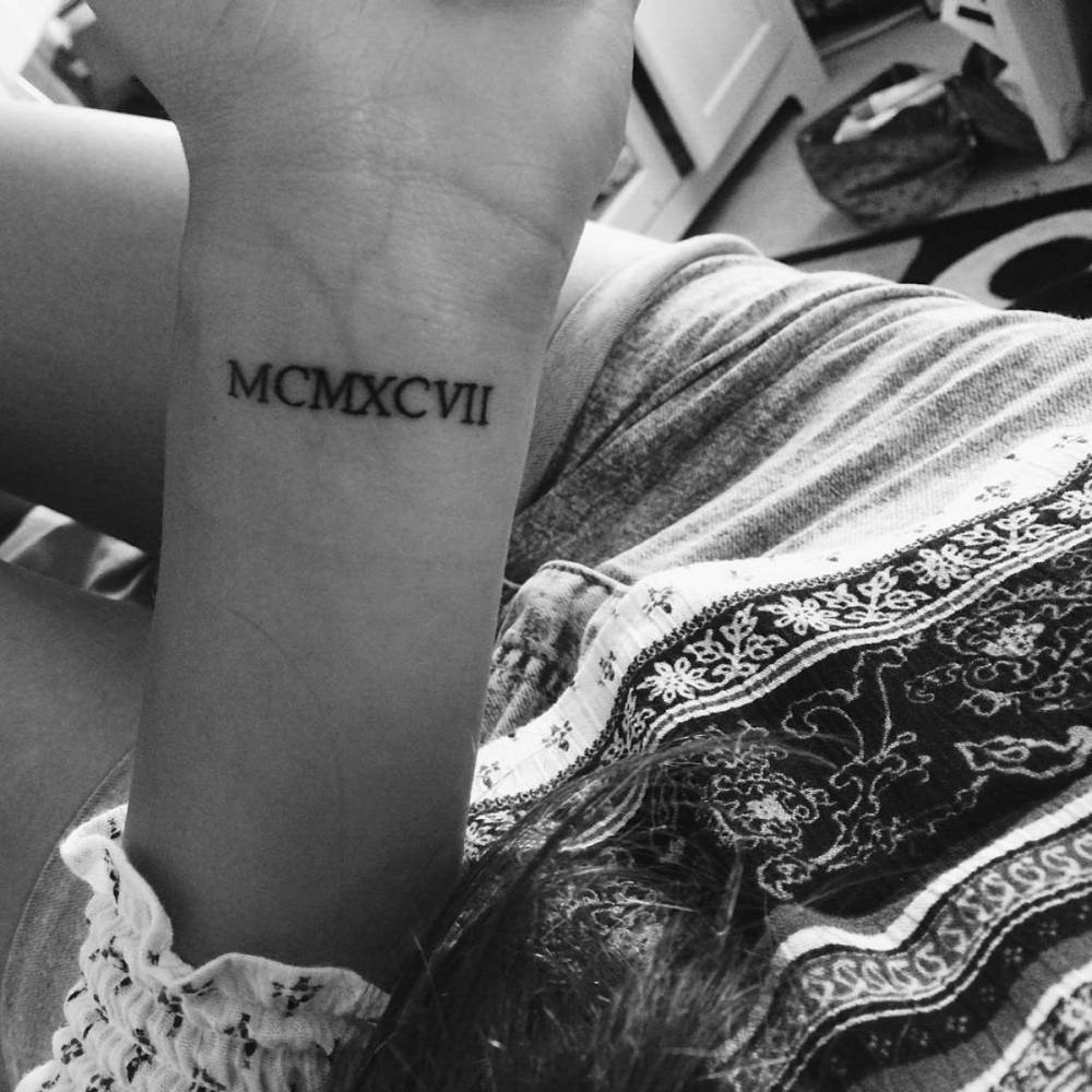 1997 in roman numerals tattoo