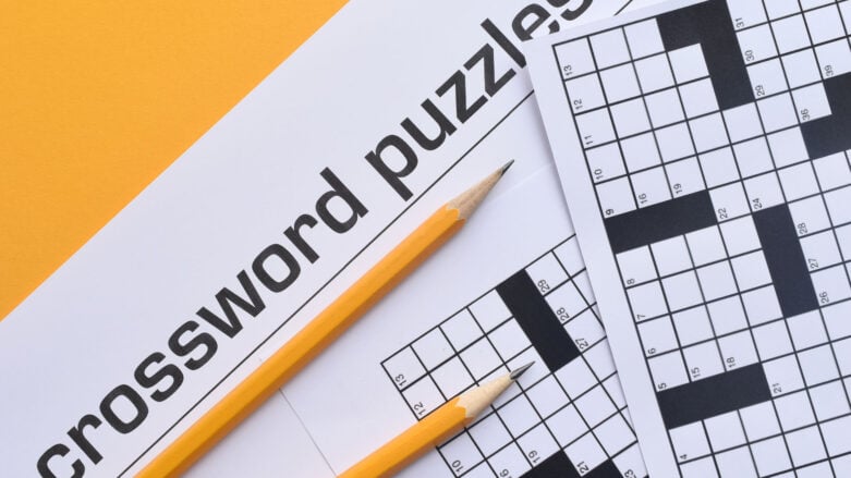 tropical parrot crossword clue