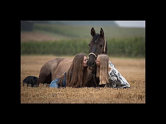 two girls one horse video