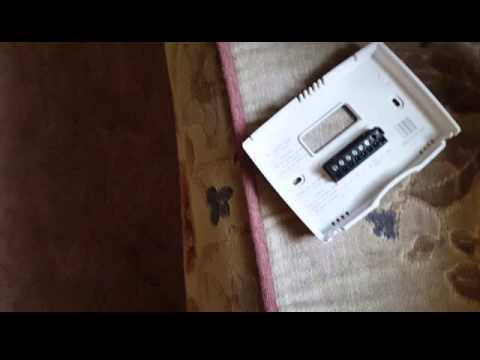 removing honeywell thermostat cover