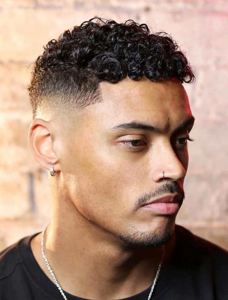 curly top mid fade