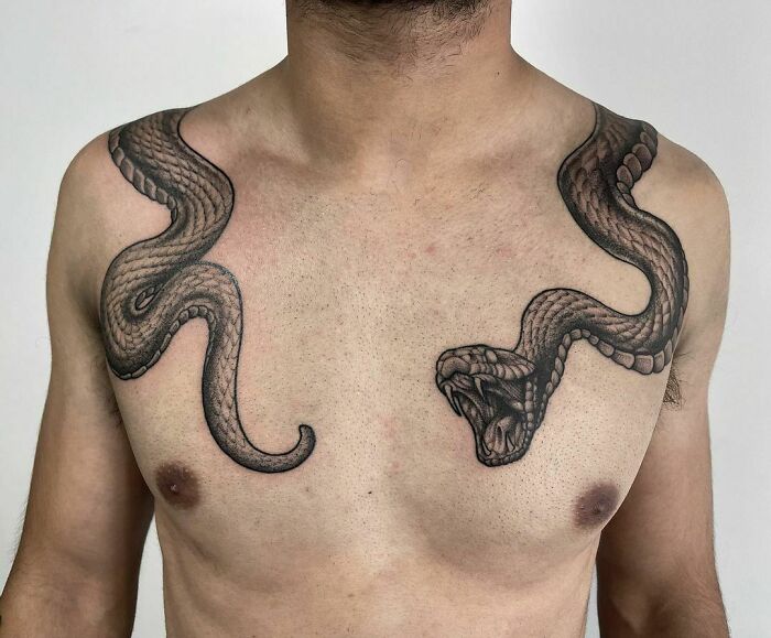 snake chest tattoo