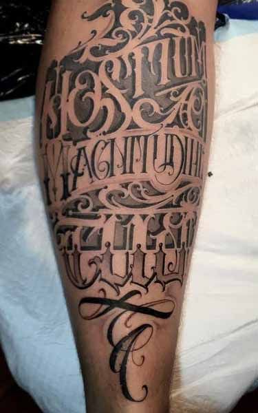 lettering tattoo leg