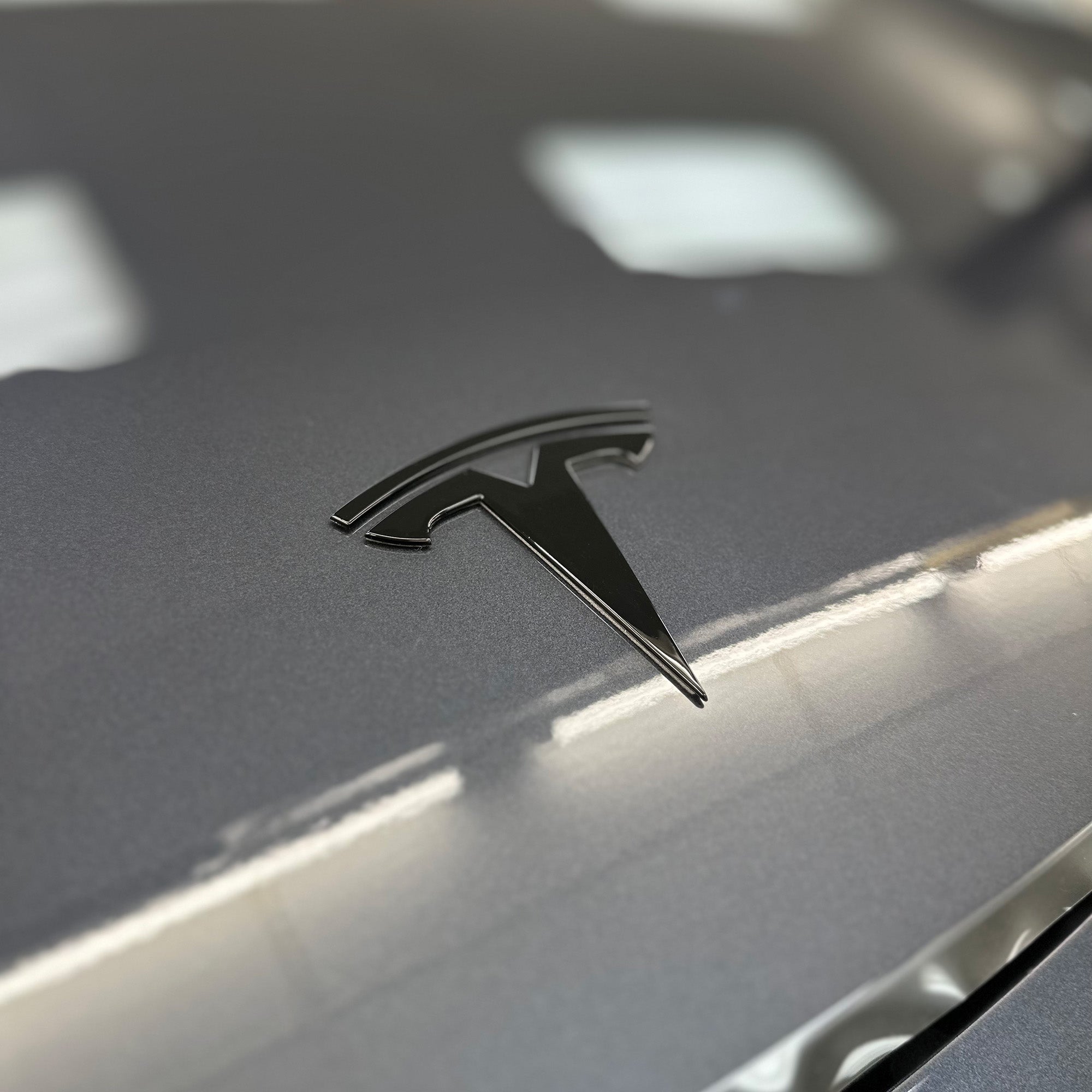 tesla model 3 emblem