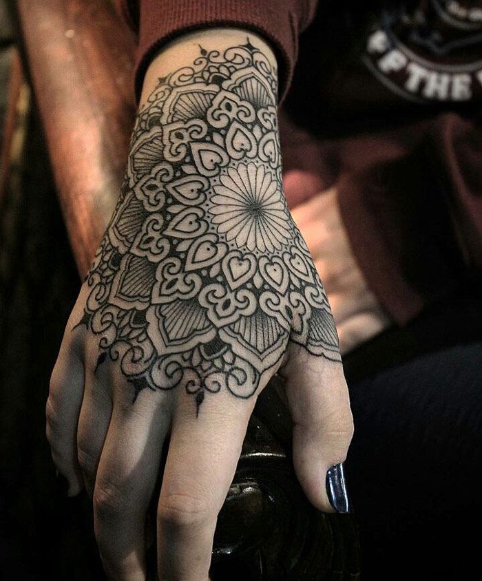 hand mandala tattoos