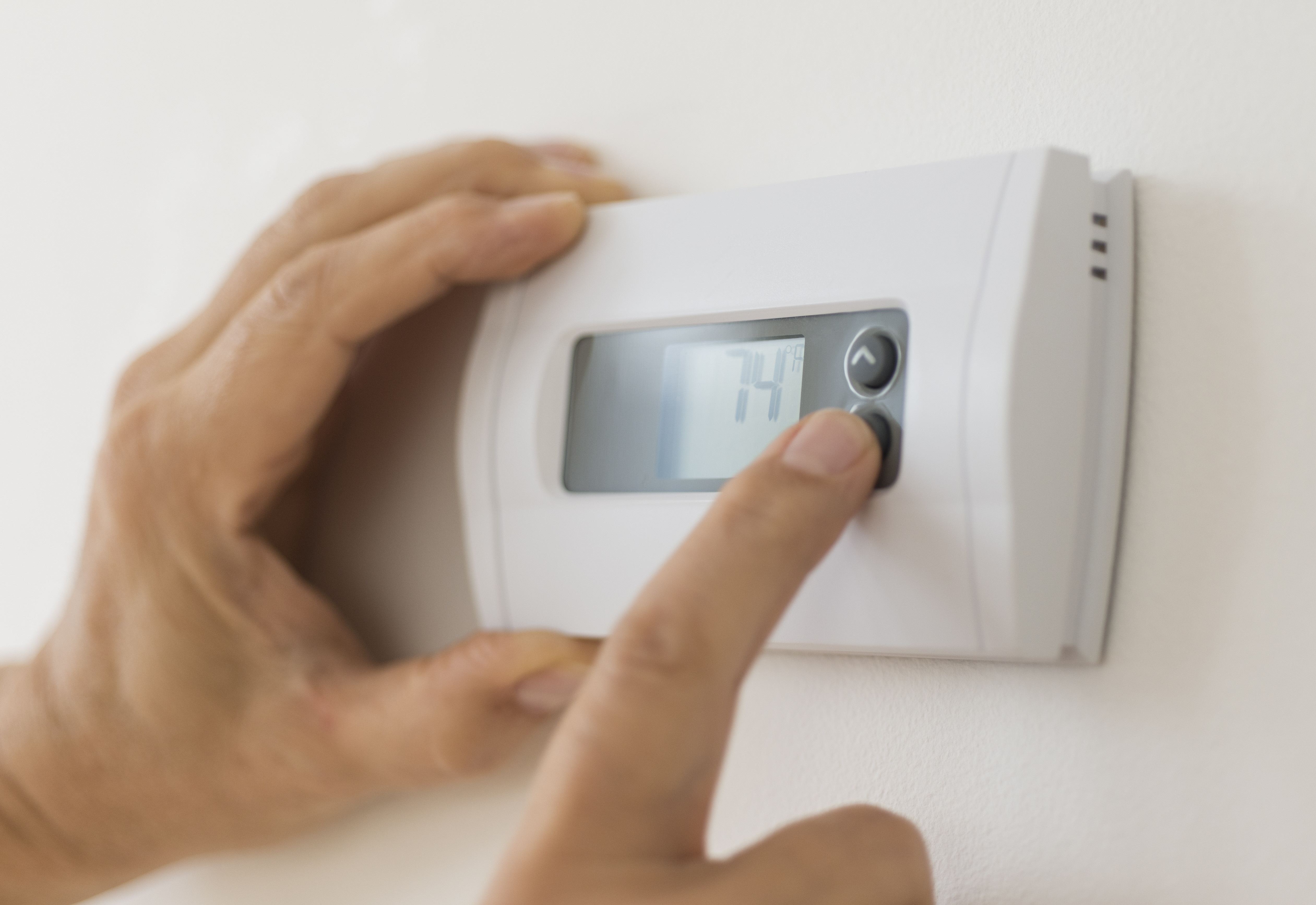 how to change battery on honeywell thermostat