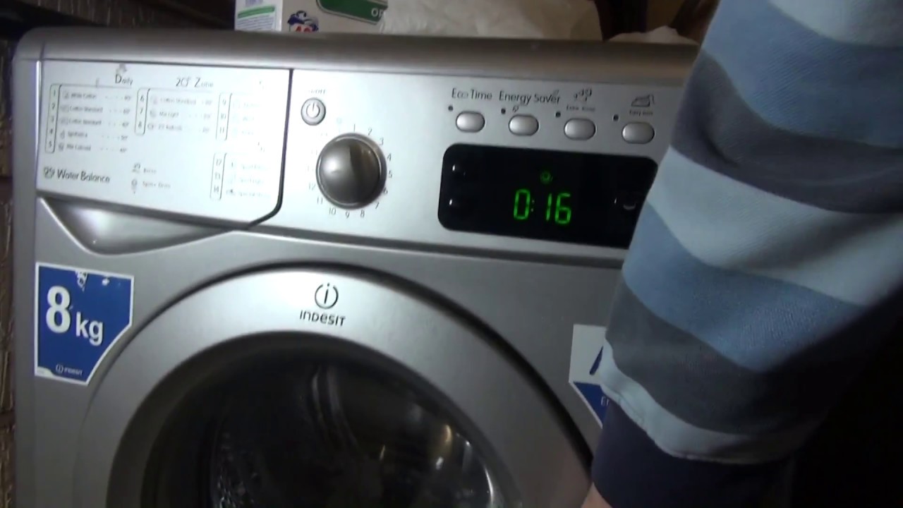 how to unlock indesit washing machine door