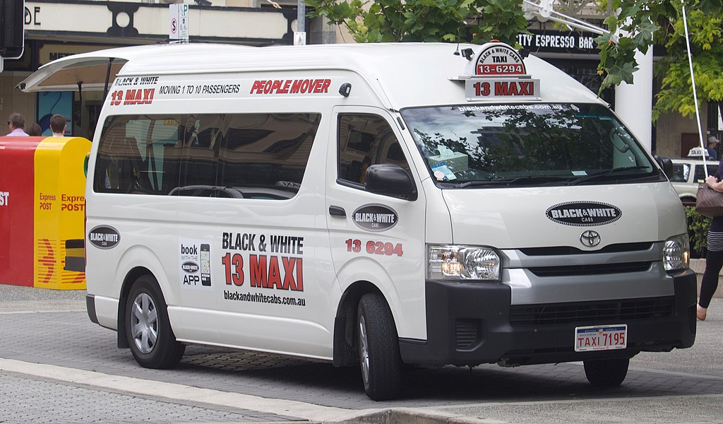 black and white maxi taxi