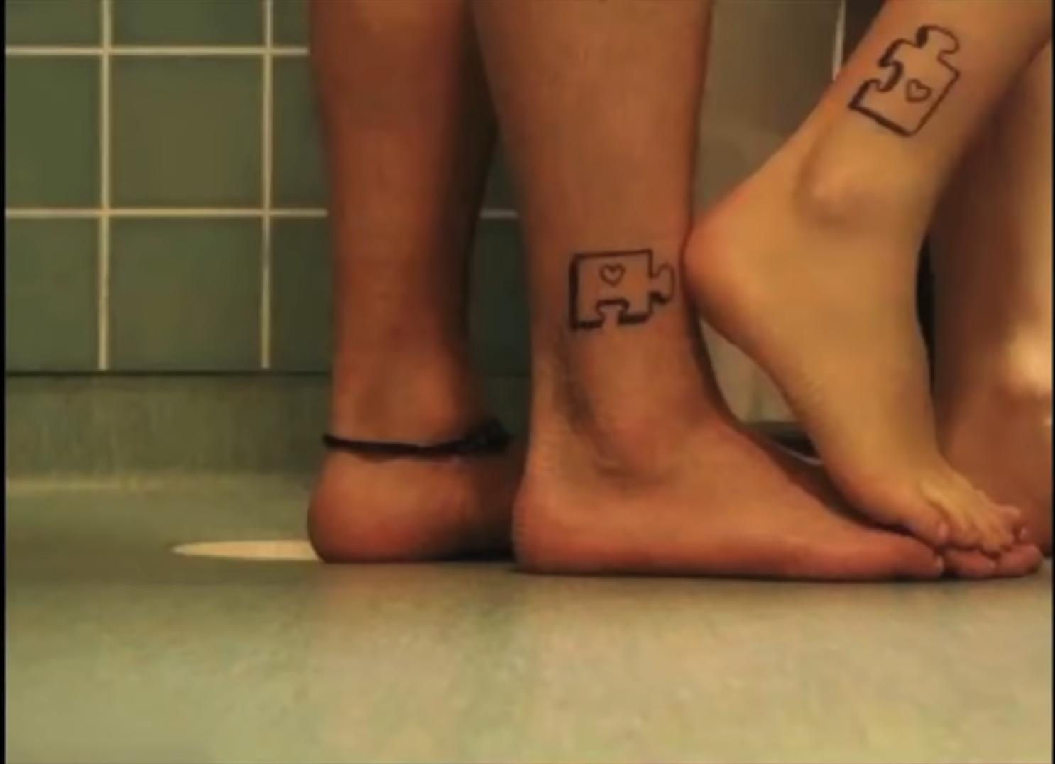 couples puzzle piece tattoo