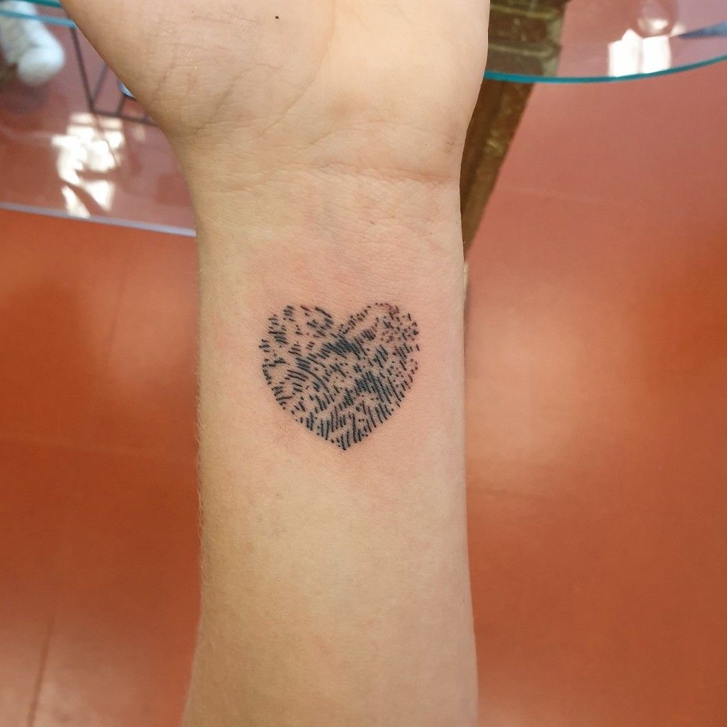 love heart finger print tattoo