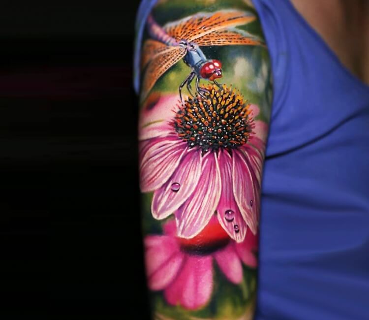 dragonfly on a flower tattoo