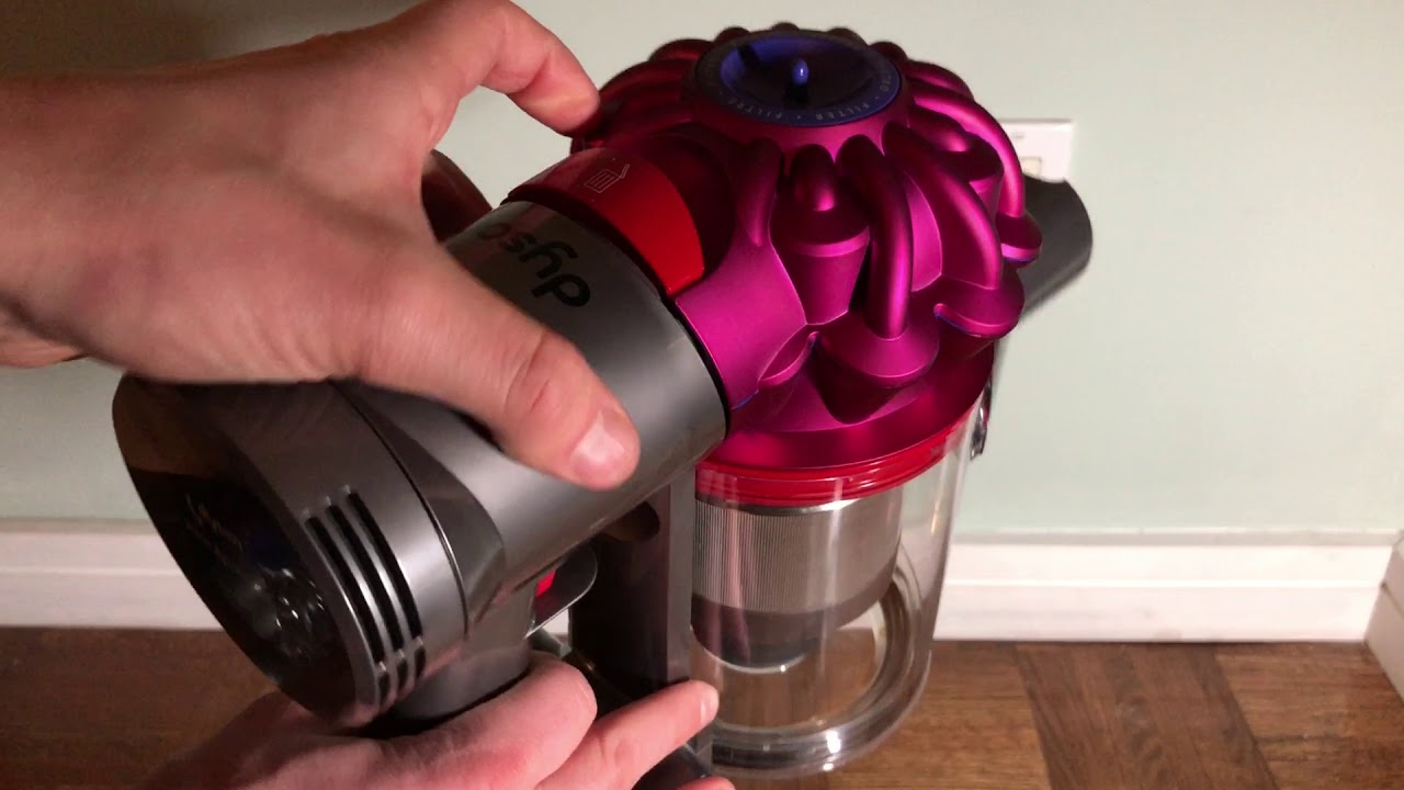 how do you open a dyson vacuum