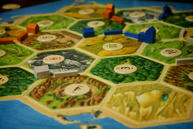 resource in the game catan crossword