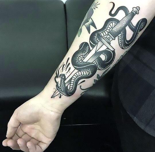 dagger with snake tattoo