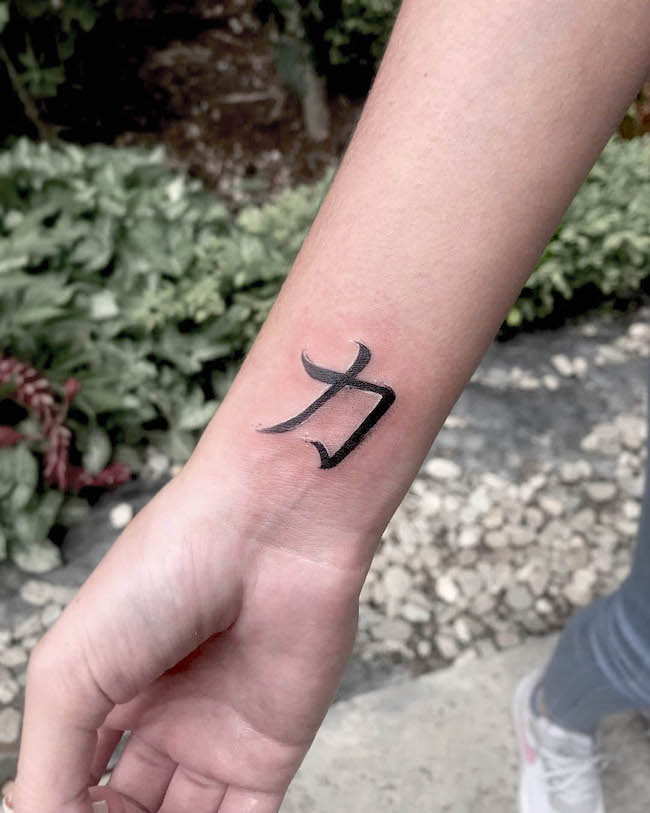 strength symbol tattoo