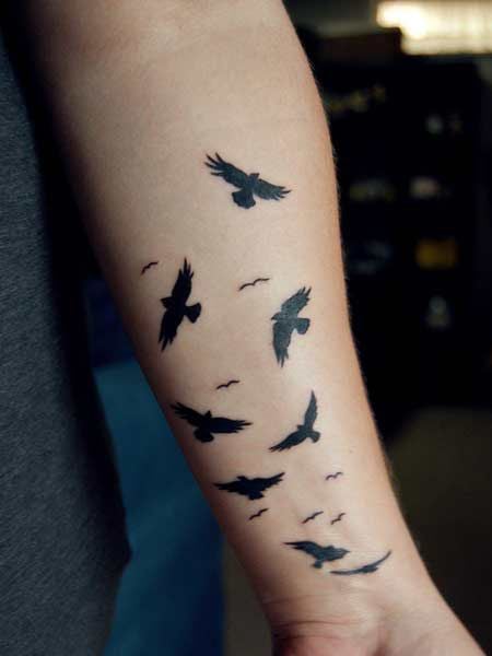 flying birds tattoo meaning