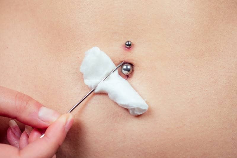 how do you clean your belly piercing