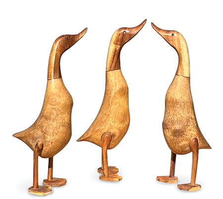 large wooden ducks