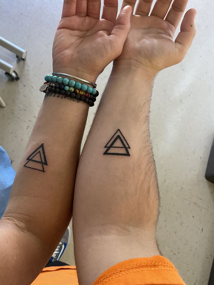 matching tattoos mom and son