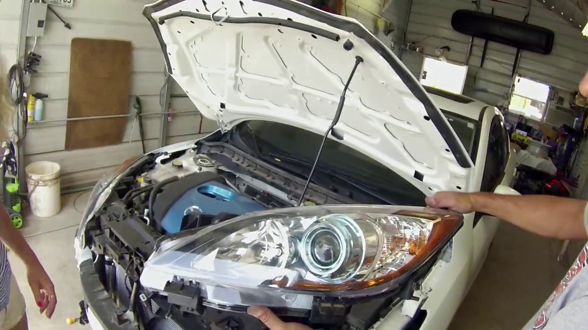 mazda 3 headlight replacement