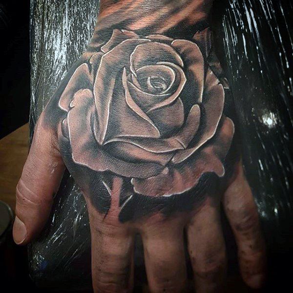 rose hand tattoo men