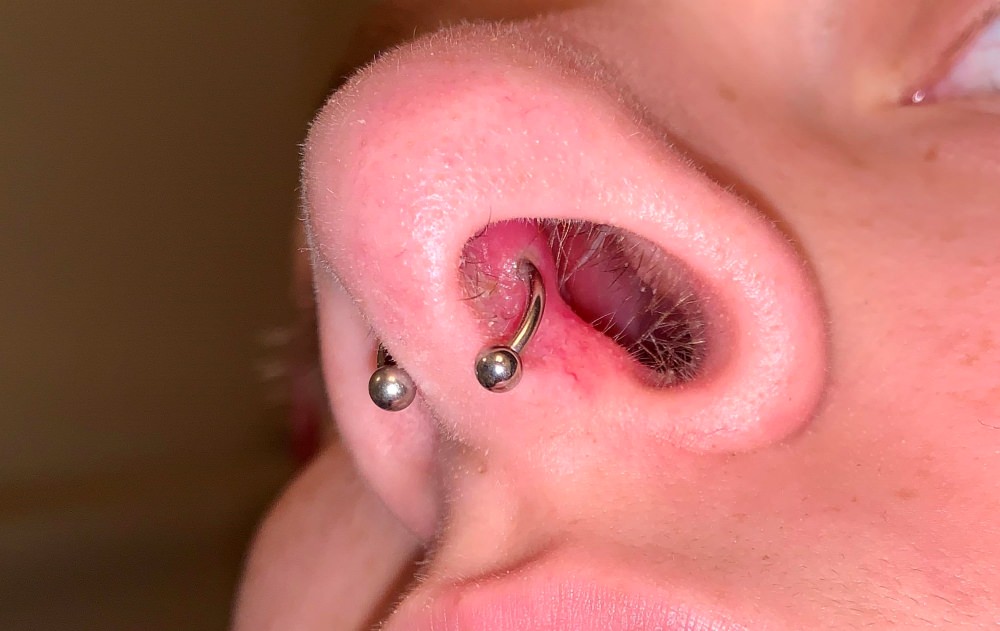 septum piercing healing stages