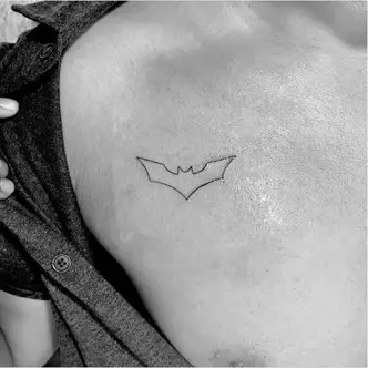 small batman symbol tattoo