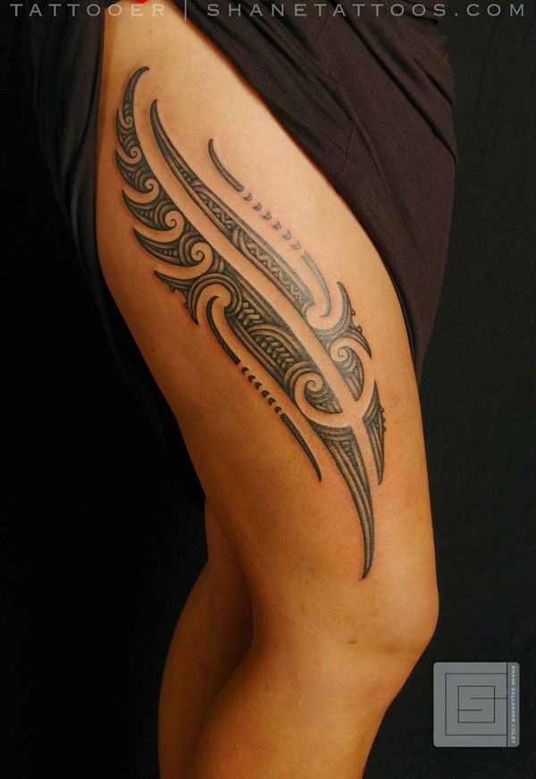 tribal tattoo on thigh